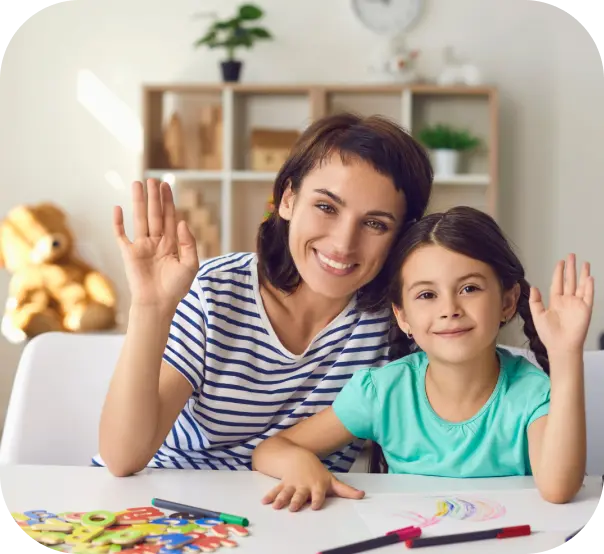 little girl studying on a computer